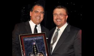 Honoree Rocky Delgadillo received his award from former City Attorney Nuch Trutanich.